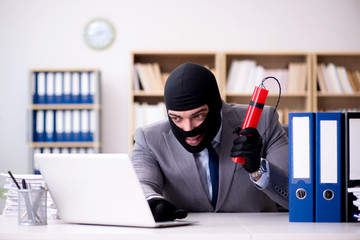 Wall Mural - Criminal businessman with dynamite in the office