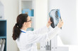 © Africa Studio - Beautiful young orthopedist working in office