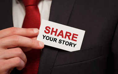 Aufkleber - Businessman putting a card with text Share your story in the pocket