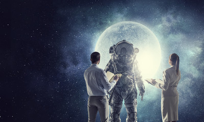 Wall Mural - Scientists designing space suit. Mixed media