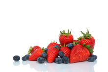 Fresh Strawberries And Blueberries On A White Background