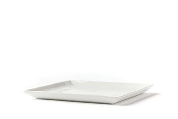 Side view of square white plate