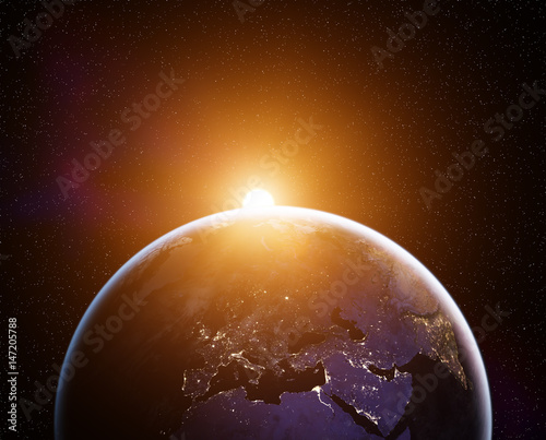 Zdjęcie XXL Planeta ziemia z wschodzącego słońca, widok z kosmosu. Elementy tego obrazu dostarczone przez NASA
