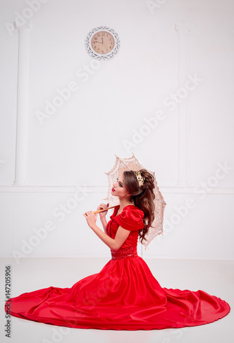 Woman in Dress Sitting On Floor