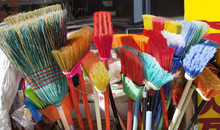 Colorful Brooms For Sale.
