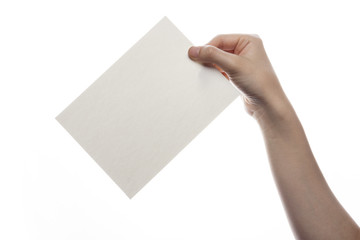 woman hand hold a paper(post card) isolated white.