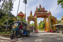 Tuk Tuk Motorbike Taxi In Wat Si Muang Buddhist Temple In Vientiane, Laos
