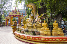 Row Of Gold Buddha Statues In Wat Si Muang Buddhist Temple In Vientiane, Laos
