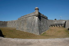 Corner Of Castillo De San Marcos, Green Grass And Former Moat Of Fortress.  Turret And Battlements Of Ancient Stone Fort, Oldest Fortress In America Built In 1672 In Matanzas Bay, St Augustine Florida