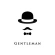 Vintage silhouette of bowler, mustaches and the bow tie. Vector illustration of gentleman. 