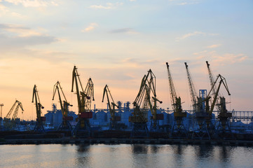 Port cargo crane at sunset