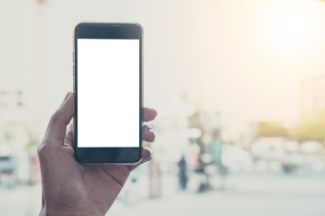 Man using smartphone in cafe. woman using smartphone white screen. using vintage tone.