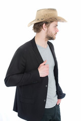 Wall Mural - cowboy hat in hand of happy businessman in suit jacket