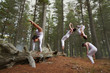 © Connect Images - Dancers jumping in forest