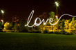 © Connect Images - Love written by light trail at night