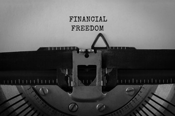 Fototapete - Text Financial Freedom typed on retro typewriter