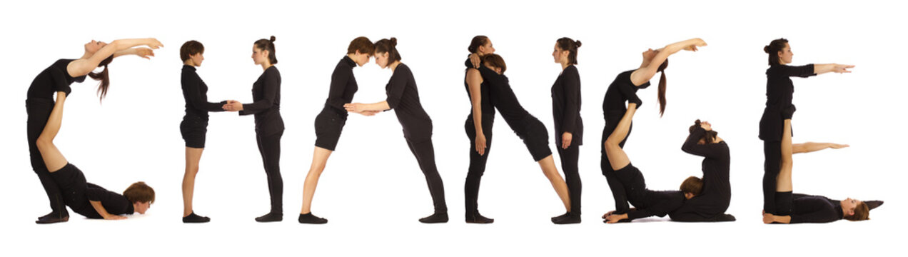 Black dressed people forming word CHANGE