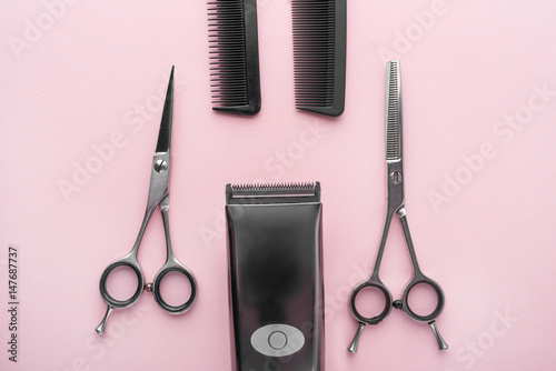 Fotografie, Obraz Tools for hair styling on pink background top view