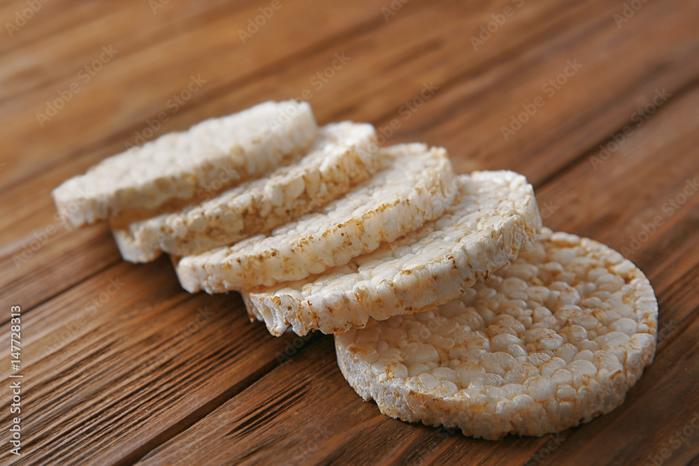Rice crackers on wooden background