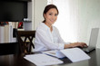 © tuiphotoengineer - Asian business women using notebook and  smiling happy for working