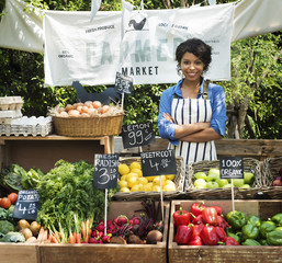 Wall Mural - Greengrocer selling organic fresh agricultural product at farmer market