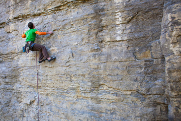 climber climbs the rock..