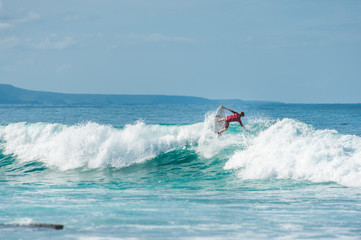 Surfer riding the ocean waves