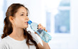 © fotofabrika - Beautiful young fitness woman with perfect body shape drinking fresh water