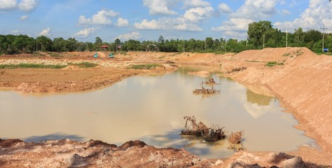 Dredging ponds for use in agriculture in the dry season