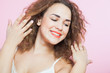 © okfoto - Closeup portrait woman with curly hair beauty and fashion