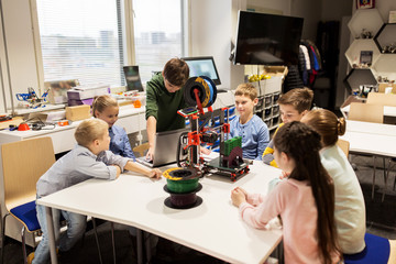 Wall Mural - happy children with 3d printer at robotics school