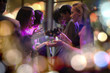 © Westend61 - People socializing on a party