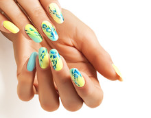 Art Nails With A Bright Yellow-blue Design.