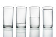 .tall empty, half and full glass of water isolated on white with clipping path included