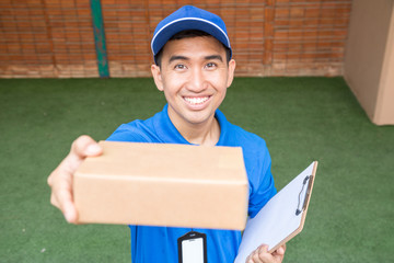 Delivery man shipping the box to client