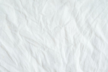 wrinkled white cotton fabric texture background, wallpaper