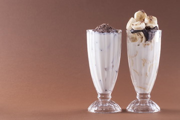 Canvas Print - Three milkshakes on a bright background