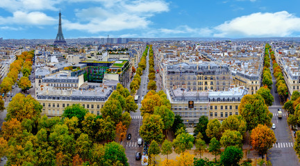 Wall Mural - Paris, France - Eiffel Tower cityscape. Panorama from the Arc de Triomphe. Blue sky with clouds in autumn