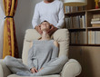 © dream@do - Couple in love relaxing at home. Man making massage to his girlfriend.