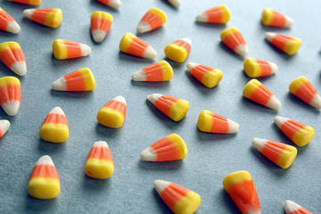 Wall Mural - Tasty Halloween candies on light background