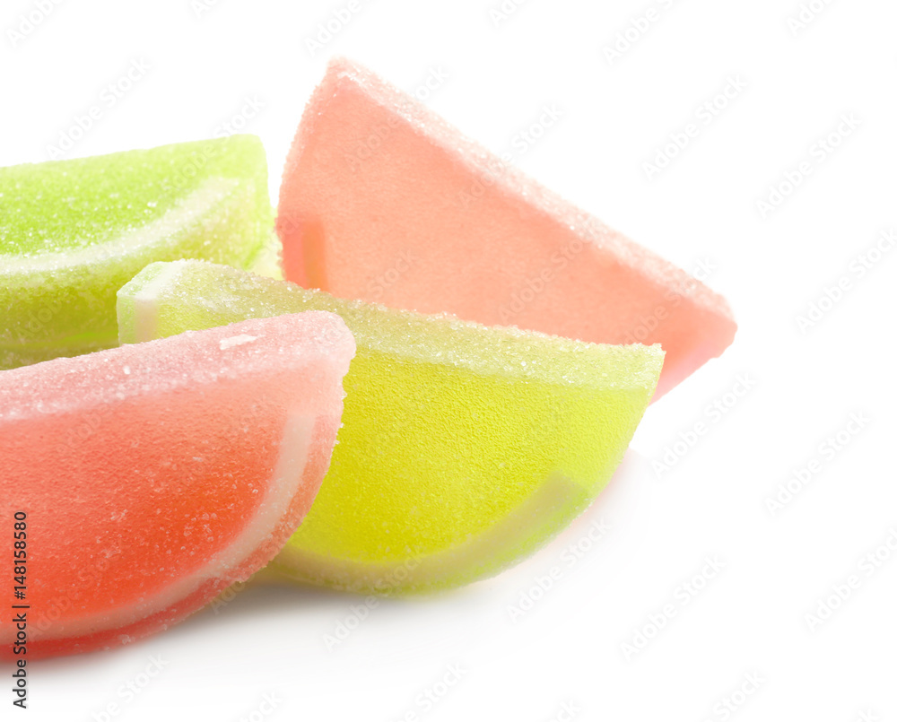 Tasty jelly candies on white background
