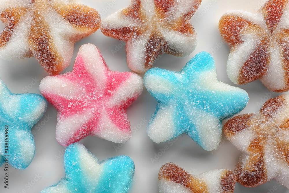 Tasty jelly candies on white background, closeup