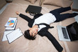 © Jestercine - Asian businessman is deep sleeping in his bed at night, man tired to work concept, 20s age.