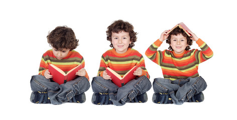 Sticker - Three equal children reading a red book seated