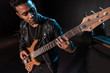 © LIGHTFIELD STUDIOS - Electric guitar player performing hard rock music with bass guitar on stage