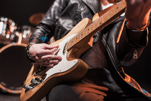 Close-up Partial View Of Rock Star Playing Hard Rock Music On Stage