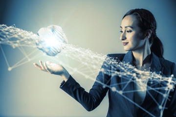Aufkleber - young woman engineer holding her hand under a 3D object. 3D rendering graphics. abstract mixed media.