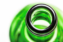 Green Glass Wine Bottle Closeup Isolated On White.