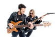 © LIGHTFIELD STUDIOS - two musicians playing electric guitars isolated on white, electric guitar rock concept