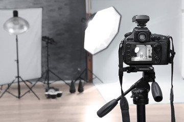 Modern photo studio with professional equipment